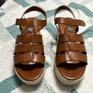 Gently used Marc Fisher size 7.5 brown wedge sandals